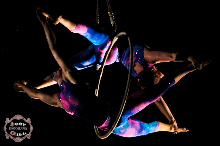 The 2 Lisas performing doubles hoop for the Invisable Circus in a big top | Photographer Joey Gill