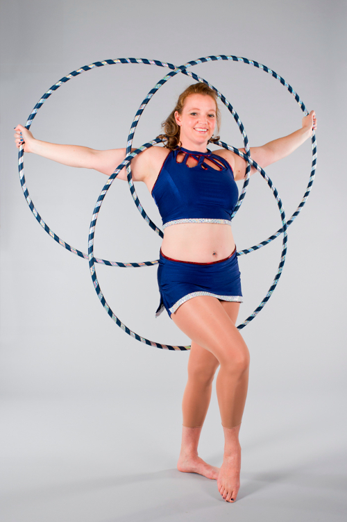 Lisa T in a 4 hoop hulahoop pose | The 2 Lisas