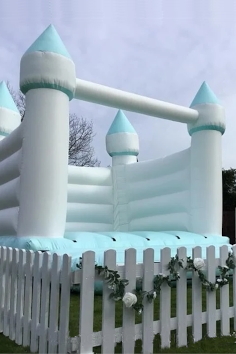 Turret wedding bouncy castle by Enchanted Bouncey Castles