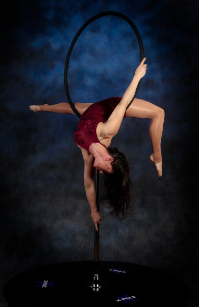 Lisa W in on a Lollipop hoop | Photographer Glenn Balsam